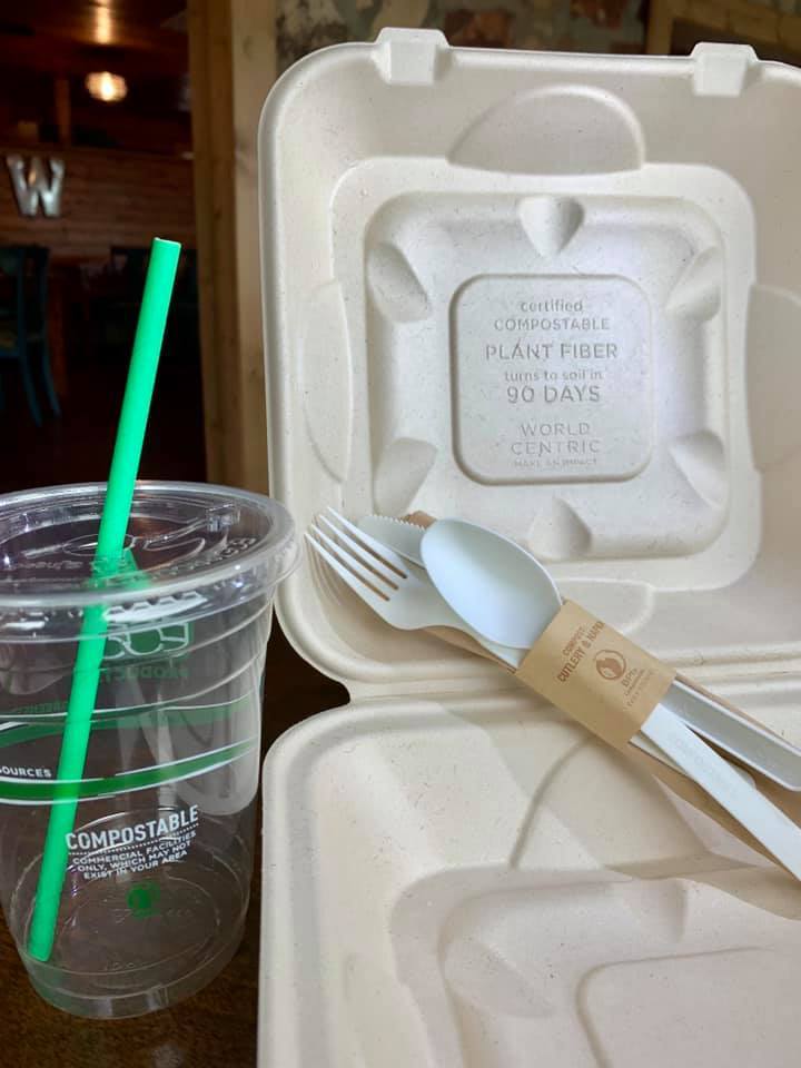 Compostable To Go Box, Silverware Set, Cup and Paper Straw on Table